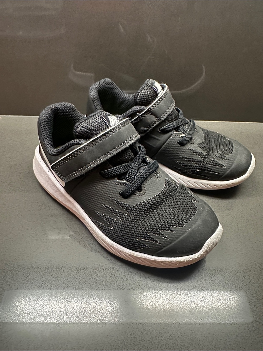 Nike Kids Black and White Athletic Sneakers with Hook-and-Loop Strap